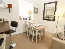 Dining room at Driftwood Apartment - thumbnail photo