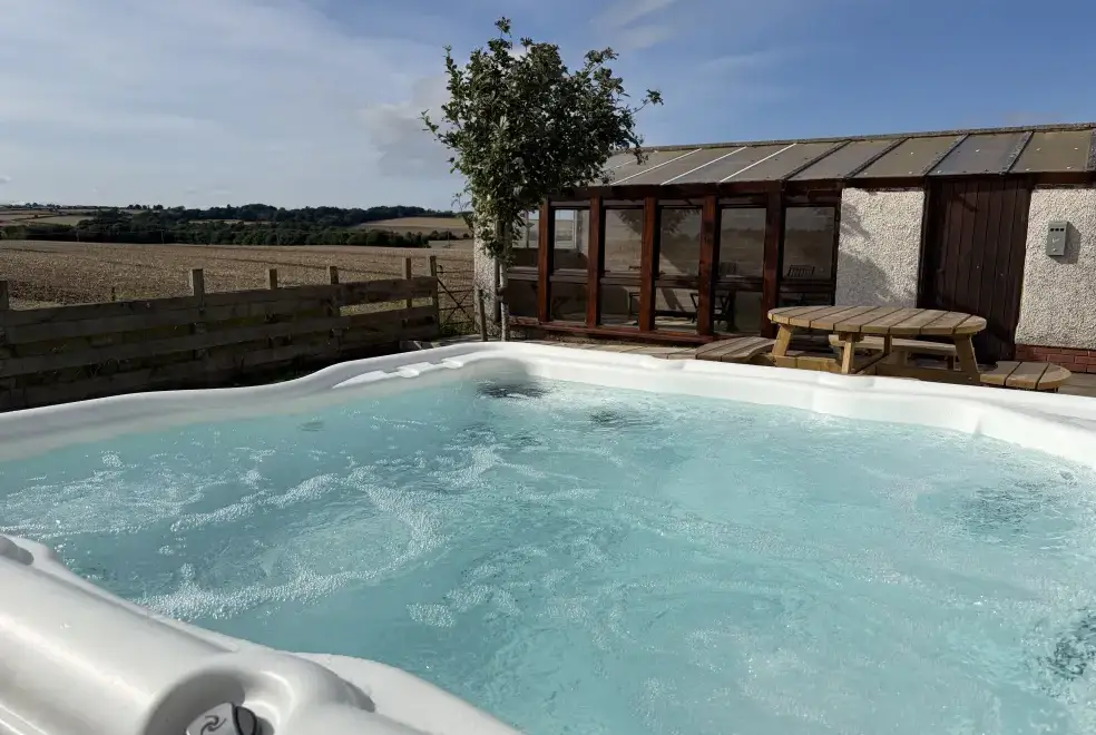 Hot tub with views at Edington Mains House