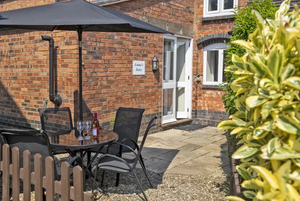 Patio area at Emma's Dairy - With Indoor Pool, Sports Area & Under 5yrs play area included