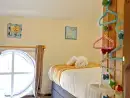 Bedroom at Emma's Dairy - With Indoor Pool, Sports Area & Under 5yrs play area included - thumbnail photo
