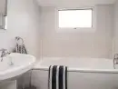 Family bathroom at Fairlight View - thumbnail photo