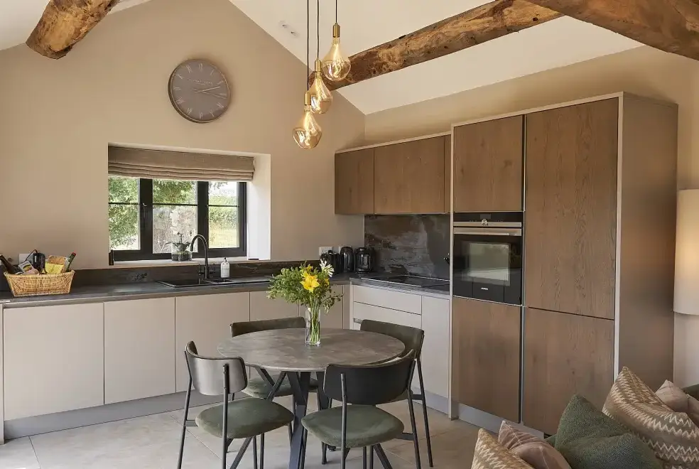 Kitchen/diner at Field Barn sleeps 2, with a private Steam Room and AirCon!