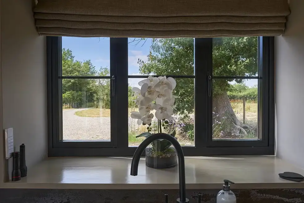 Kitchen/diner at Field Barn sleeps 2, with a private Steam Room and AirCon!