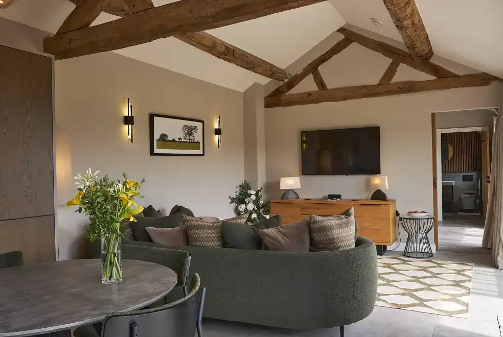 Open plan living area at Field Barn sleeps 2, with a private Steam Room and AirCon!