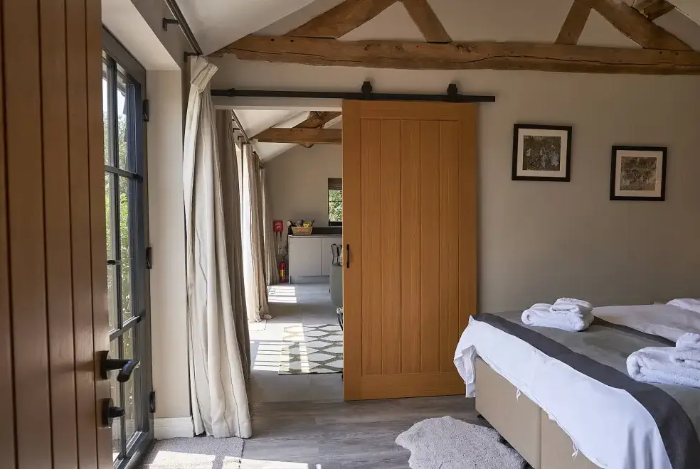 Bedroom at Field Barn sleeps 2, with a private Steam Room and AirCon!