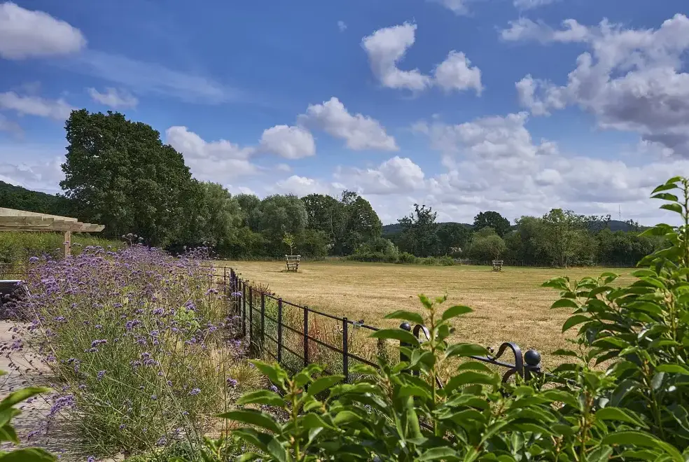 Countryside views at Field Barn sleeps 2, with a private Steam Room and AirCon!