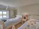 Children's bedroom at Four Ashes (Stunning Water Views) - thumbnail photo
