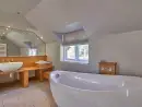 Ensuite bathroom at Four Ashes (Stunning Water Views) - thumbnail photo