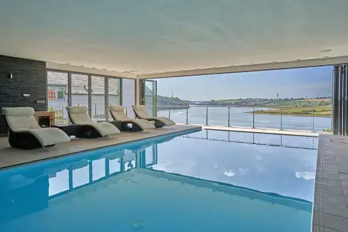 Indoor swimming pool at Four Ashes (Stunning Water Views), Pembrokeshire