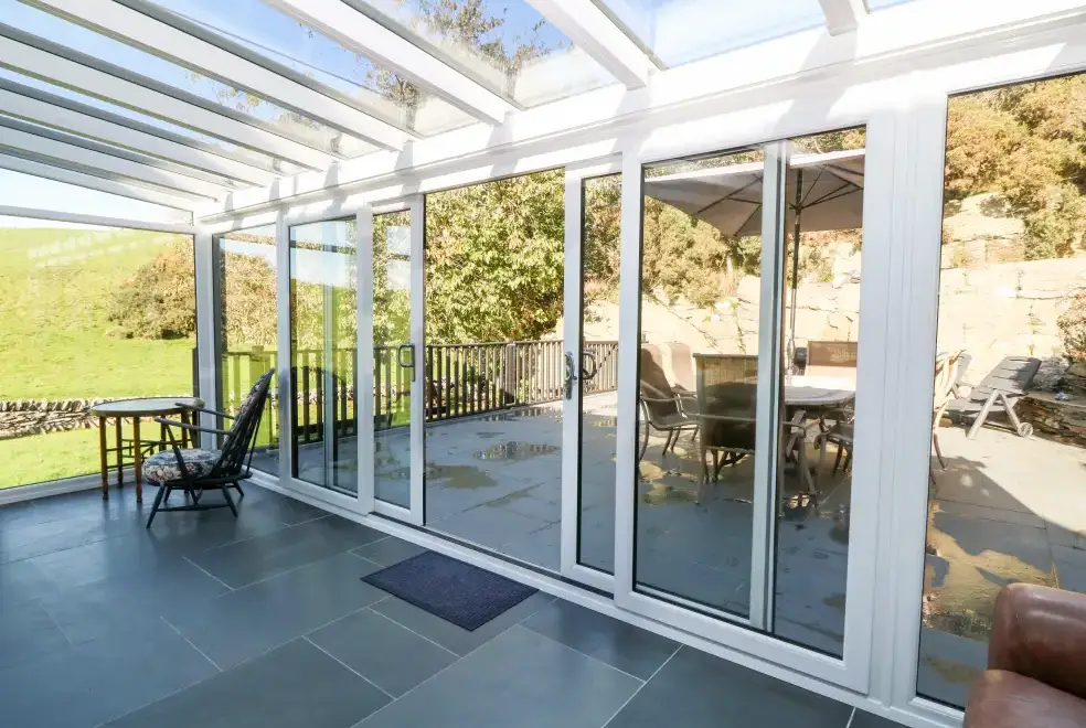 Conservatory at Garth Morthin Holiday Barn, near Snowdonia National Park