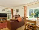 Open plan living area at Gatehouse West, Colmer Estate - thumbnail photo