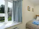 Twin bedroom at Gatehouse West, Colmer Estate - thumbnail photo
