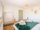 Bedroom at Giggling Goose Cottage - thumbnail photo