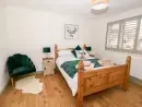 Bedroom at Giggling Goose Cottage - thumbnail photo