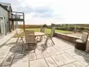 Patio area at Glowty Brynbedw - thumbnail photo