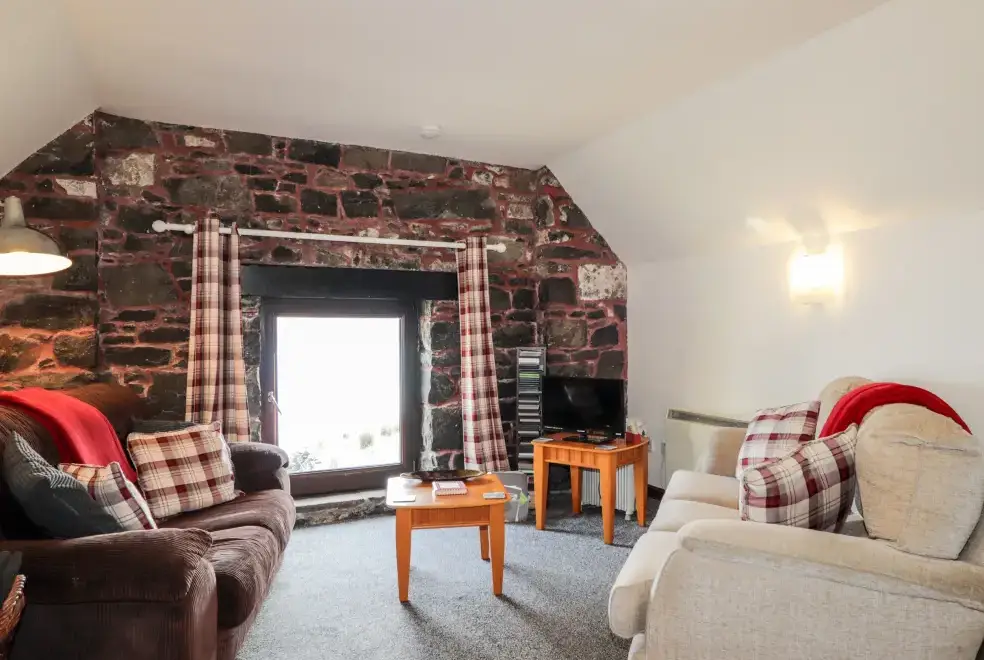 Lounge at Greshornish Boathouse Dogs-welcome Apartment, Highlands and Islands