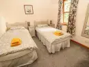 Bedroom at Grooms Cottage - thumbnail photo
