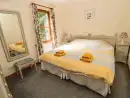 Bedroom at Grooms Cottage - thumbnail photo
