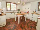 Farmhouse style kitchen at Gwern Borter Manor - thumbnail photo
