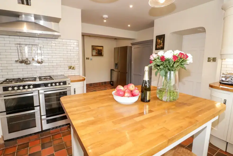 Farmhouse style kitchen at Gwern Borter Manor
