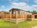 Decked area at Hedgehog Lodge - thumbnail photo