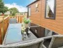 Decked area at Hedgehog Lodge - thumbnail photo