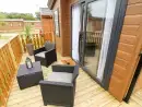 Decked area at Hedgehog Lodge - thumbnail photo