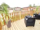 Decked area at Hedgehog Lodge - thumbnail photo