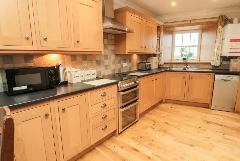 Farmhouse style kitchen at Hemmel Rural Retreat with Hot Tub