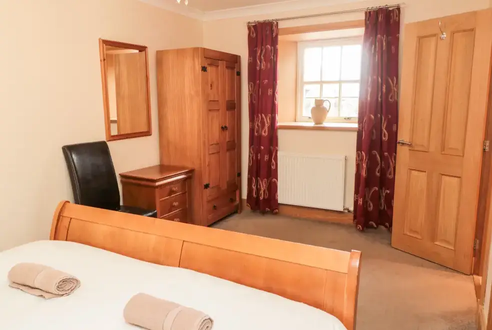 Bedroom at Hemmel Rural Retreat with Hot Tub