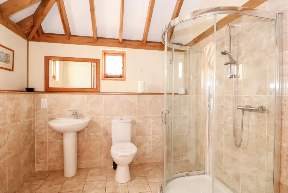 Shower room at Hideways Barn Conversion, East Anglia