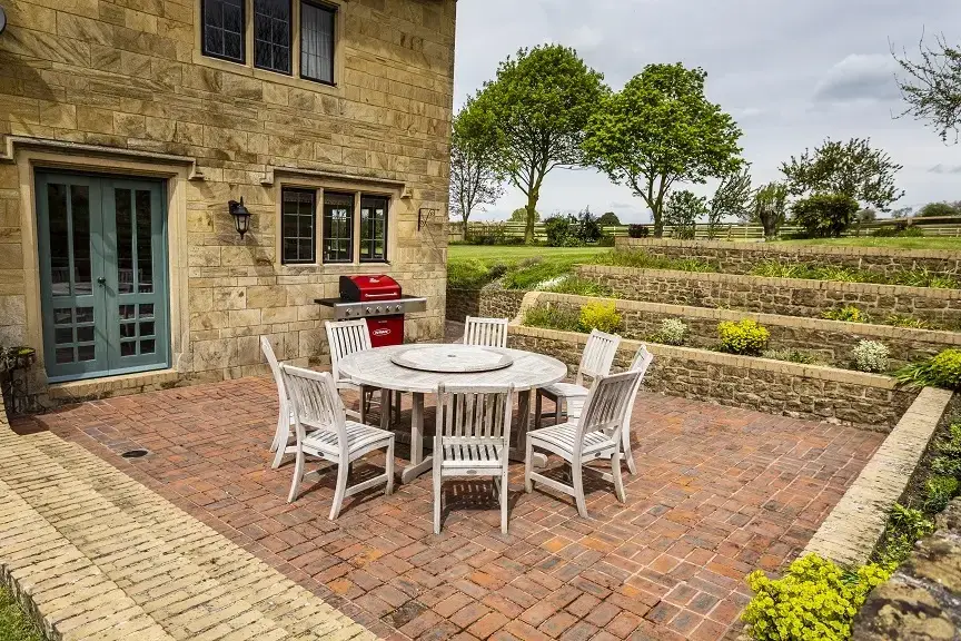 Patio area at Higher Burrow Farmhouse