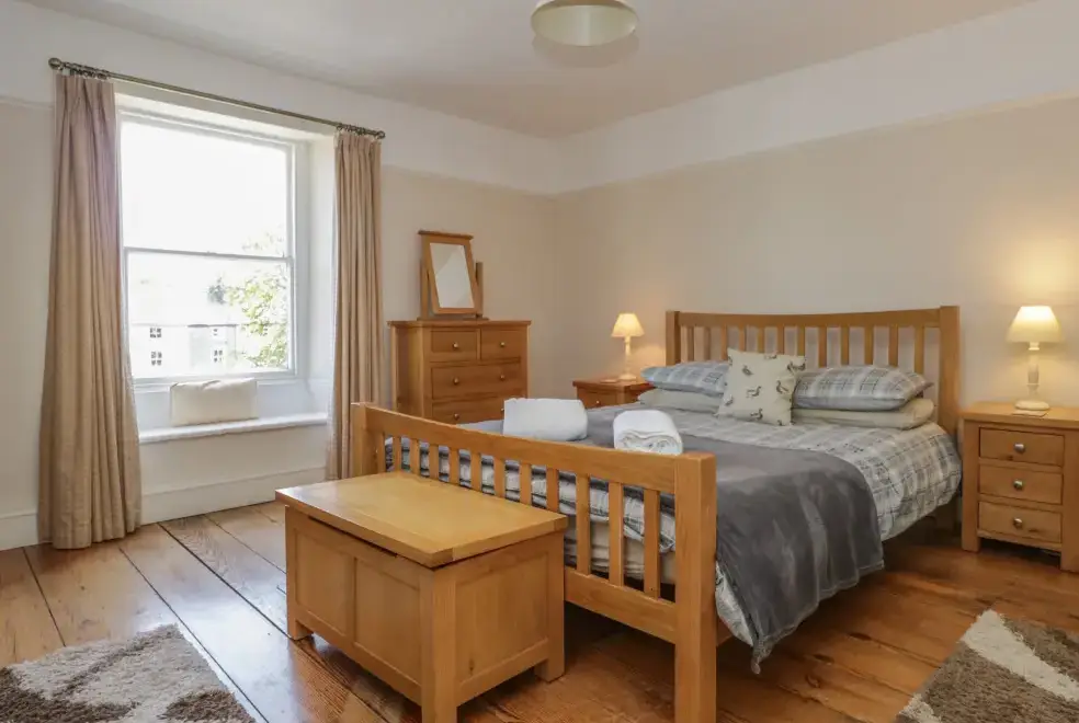 Bedroom at Hillside Pet-Friendly Cottage for 7