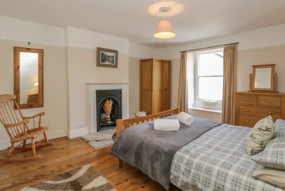 Bedroom at Hillside Pet-Friendly Cottage for 7