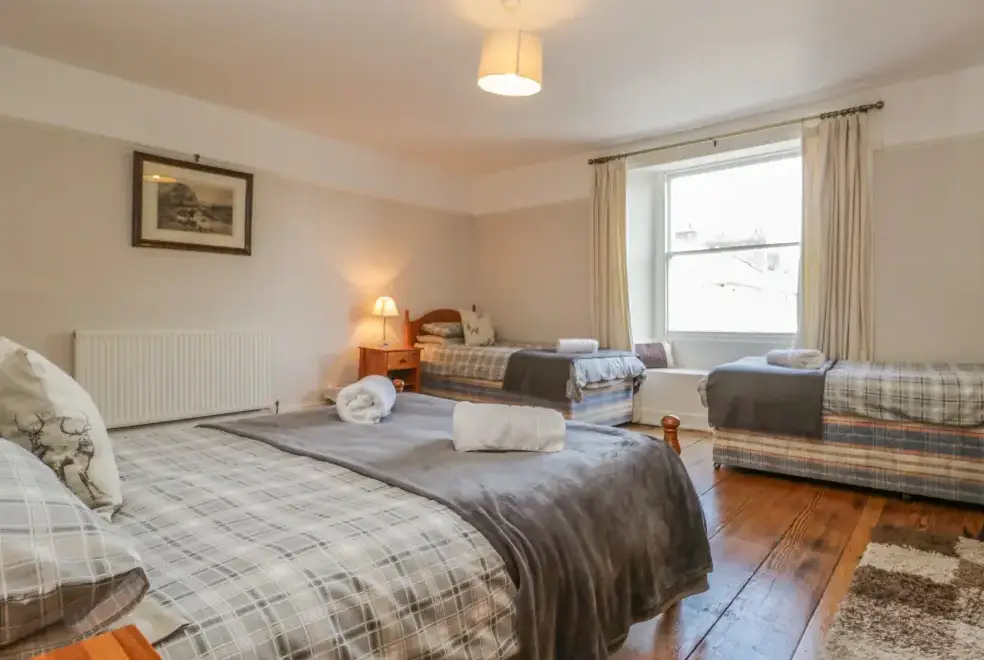 Bedroom at Hillside Pet-Friendly Cottage for 7