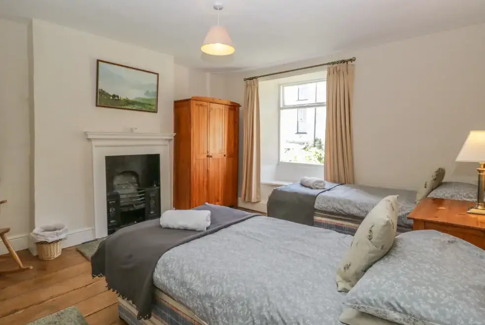 Bedroom at Hillside Pet-Friendly Cottage for 7