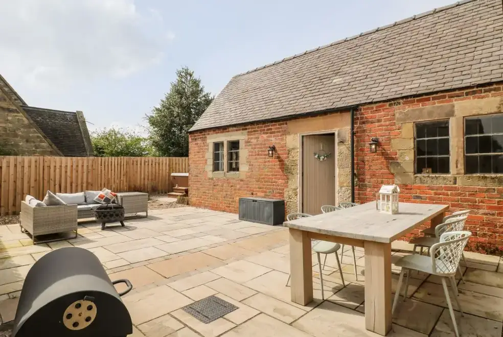 Patio area at Hunters Lodge at Wildersley Farm
