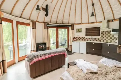Open plan living area at Island Yurt Glamping Holiday, Cotswolds, Worcestershire