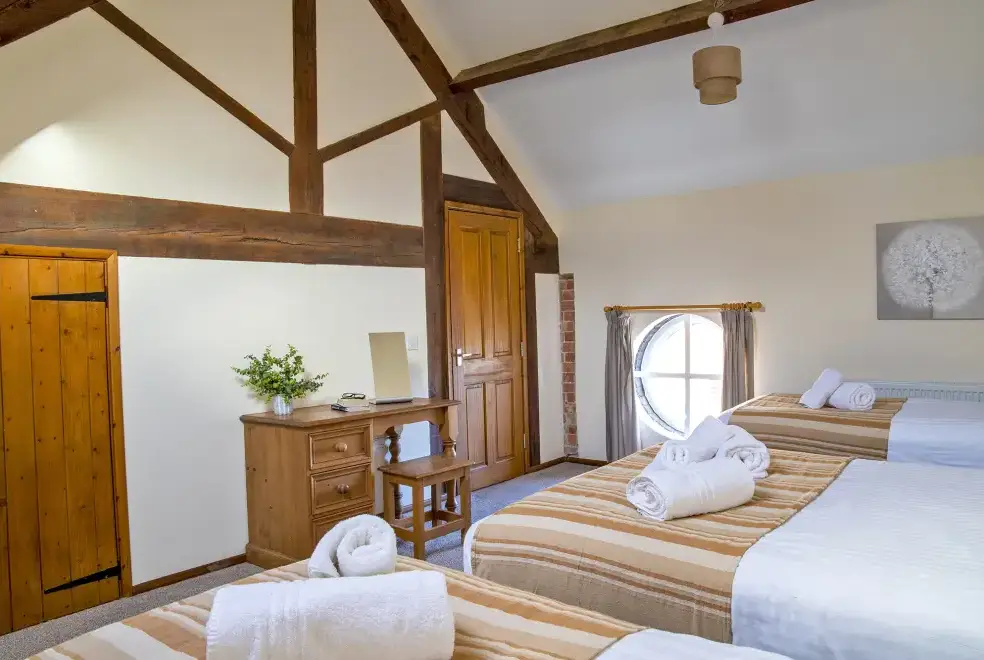 Bedroom at James's Parlour with exclusive use of shared Indoor Swimming Pool, Sports Court & Play Area