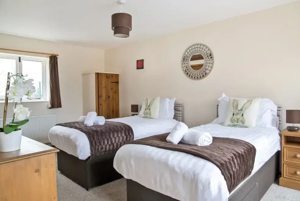 Bedroom at James's Parlour with exclusive use of shared Indoor Swimming Pool, Sports Court & Play Area