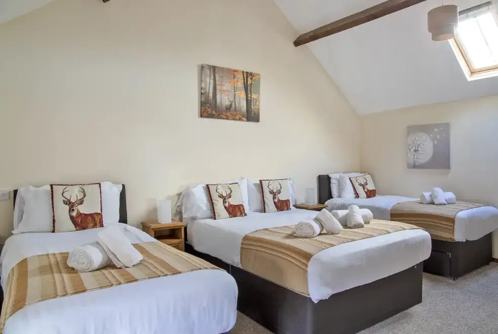 Bedroom at James's Parlour with exclusive use of shared Indoor Swimming Pool, Sports Court & Play Area