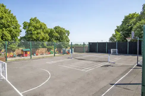 Outdoor games area at James's Parlour with exclusive use of shared Indoor Swimming Pool, Sports Court & Play Area, Shropshire