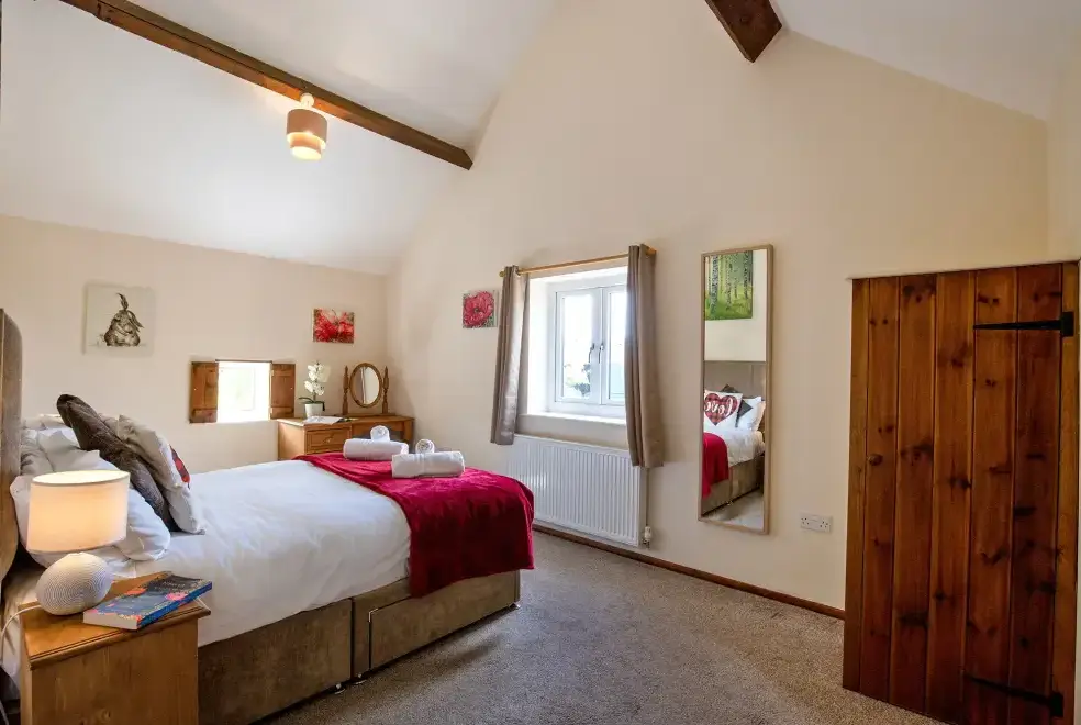 Bedroom at James's Parlour with exclusive use of shared Indoor Swimming Pool, Sports Court & Play Area