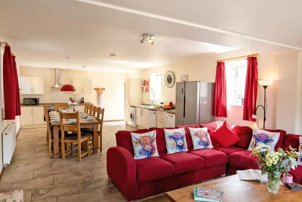 Open plan living area at James's Parlour with exclusive use of shared Indoor Swimming Pool, Sports Court & Play Area