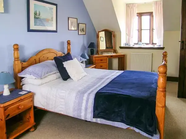 Bedroom at Kitty's Loft Self-catering Cottage, Godshill, South Coast 