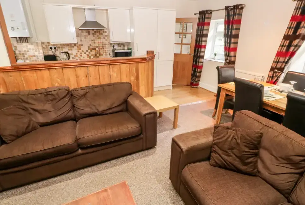 Open plan living area at Lake Cottage