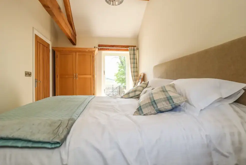 Bedroom at Lake Farm Cottage