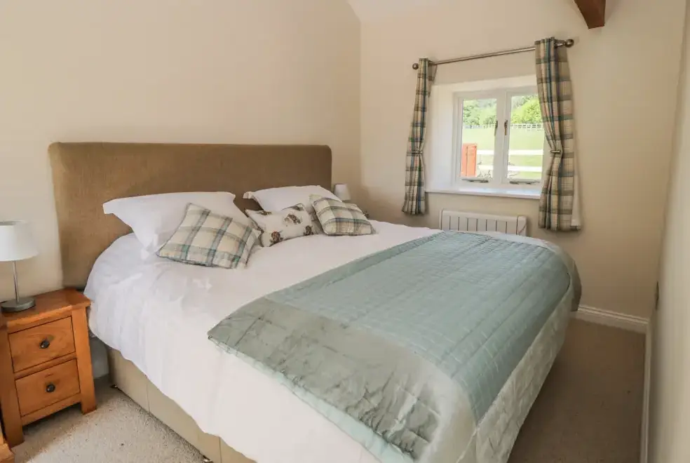 Bedroom at Lake Farm Cottage