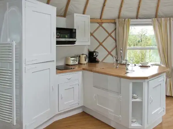 Kitchen/diner at Lakeside Yurt, Cotswolds