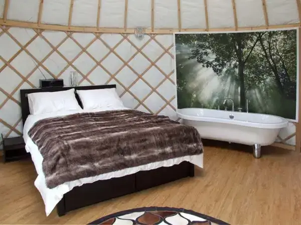 Bedroom at Lakeside Yurt, Cotswolds